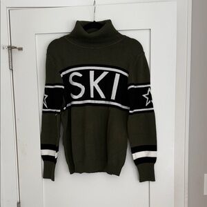 Olive Green Turtleneck Sweater with Black and White Accents